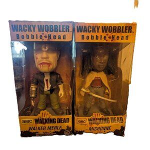 The Walking Dead Michonne & Walker Merle bobbleheads are exclusive collectibles